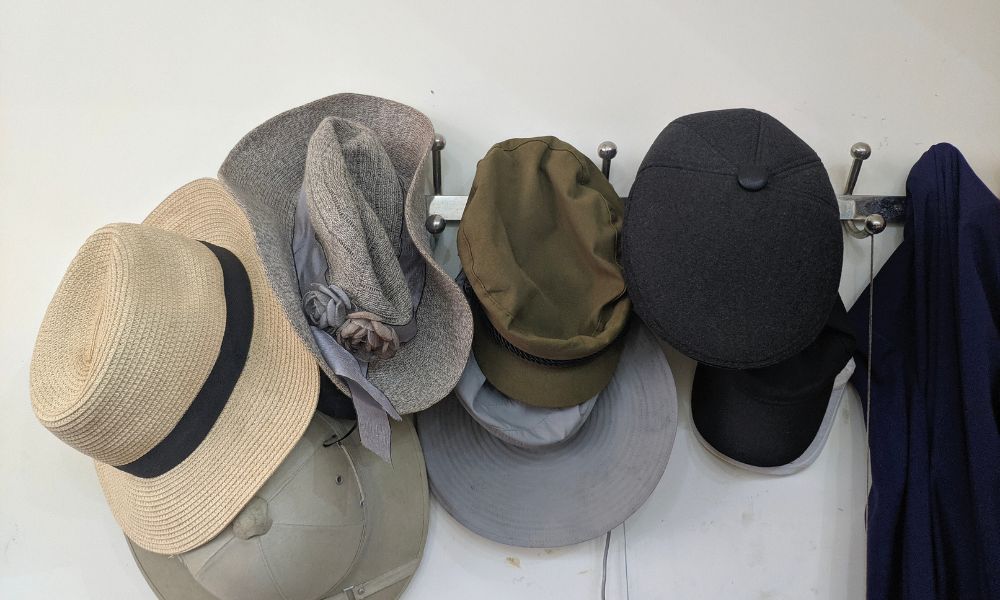 An image of a hats on a rack for an article about hat rack ideas.
