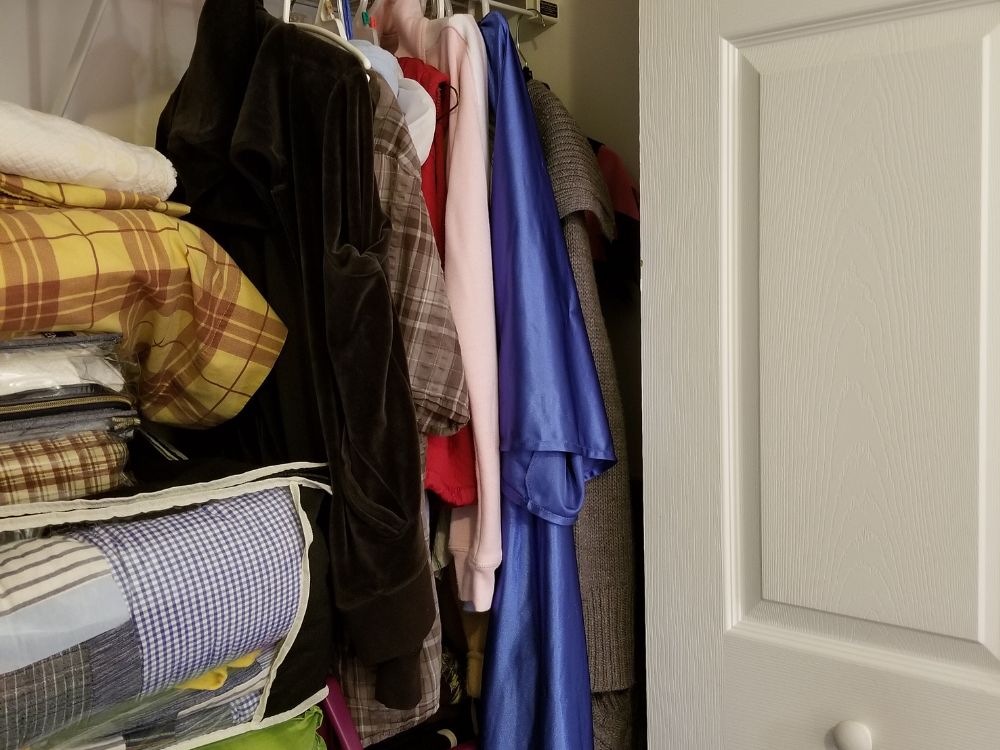An image of a small closet for an article about tiny closet design.