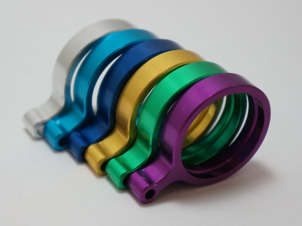 A set of anodized aluminum pieces.