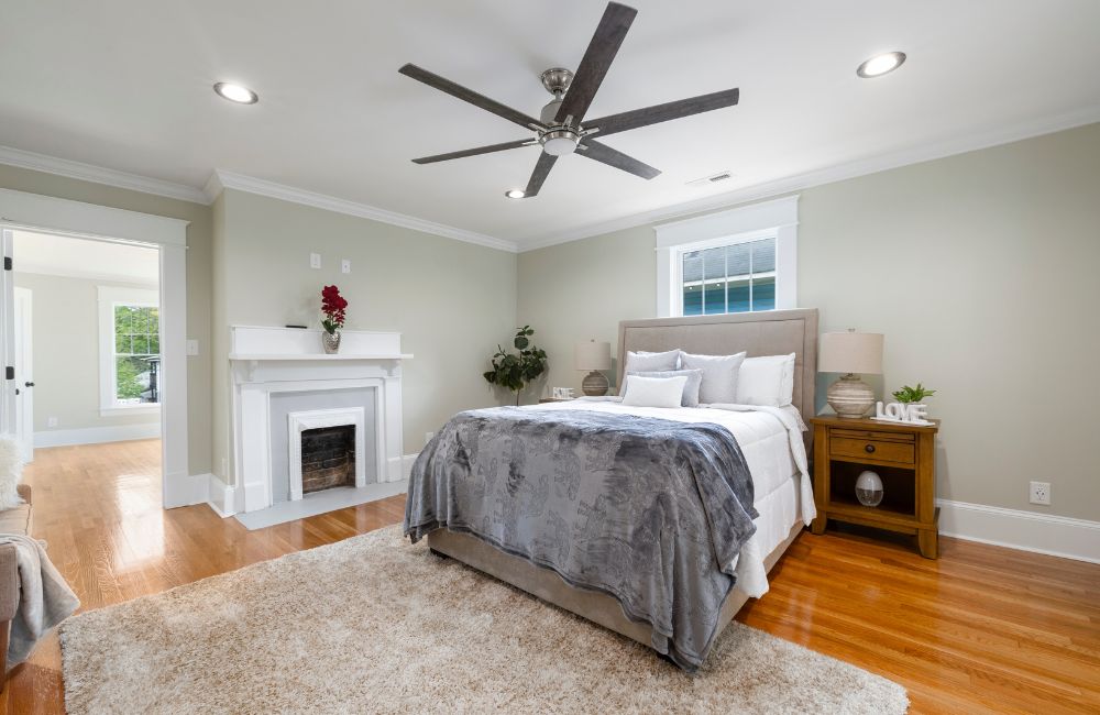 An image of a bedroom ceiling fan for an article about ceiling fan smart switch solutions.