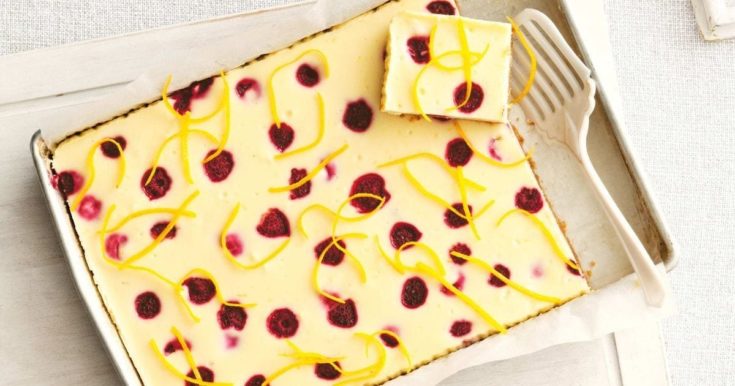White chocolate, orange and raspberry cheesecake slice