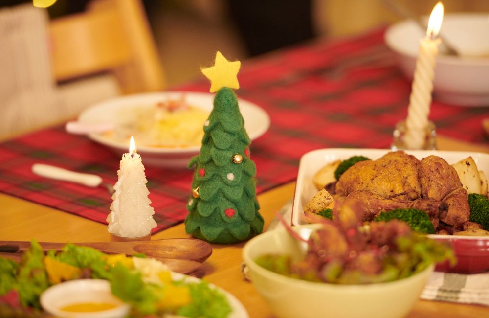 An image of a Christmas dinner table with various entrees.