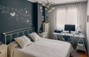 An image of a bedroom office for an article about bedroom office ideas.