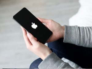 An image of the iPhone for an article about class action lawsuit on iPhones recording private chats.