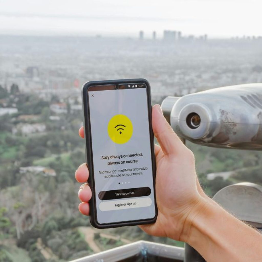 An image of a phone attempting to connect with an eSIM.