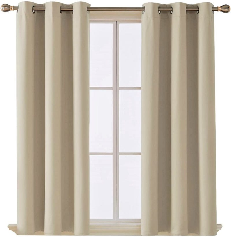 We favor the Deconovo Room Darkening Thermal Insulated Blackout Window Curtain.  This solid color blackout curtain features a smooth and elegant fabric with a silky touch and a beautiful drape.  