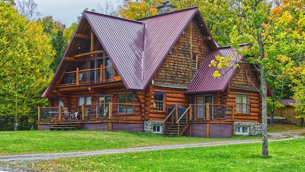 An image of a three story log cabin.