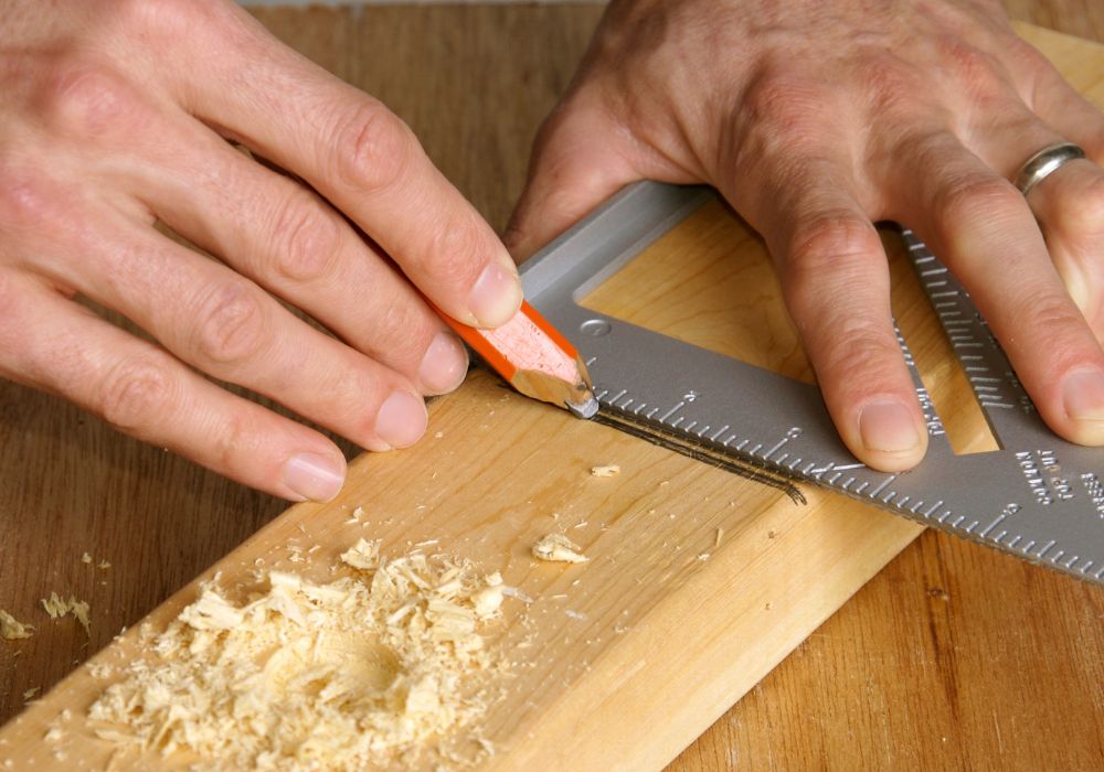 An image of a speed square being used for measurements.