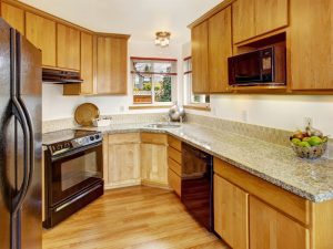 An image of a small kitchen for an article about how to make a small kitchen look bigger.
