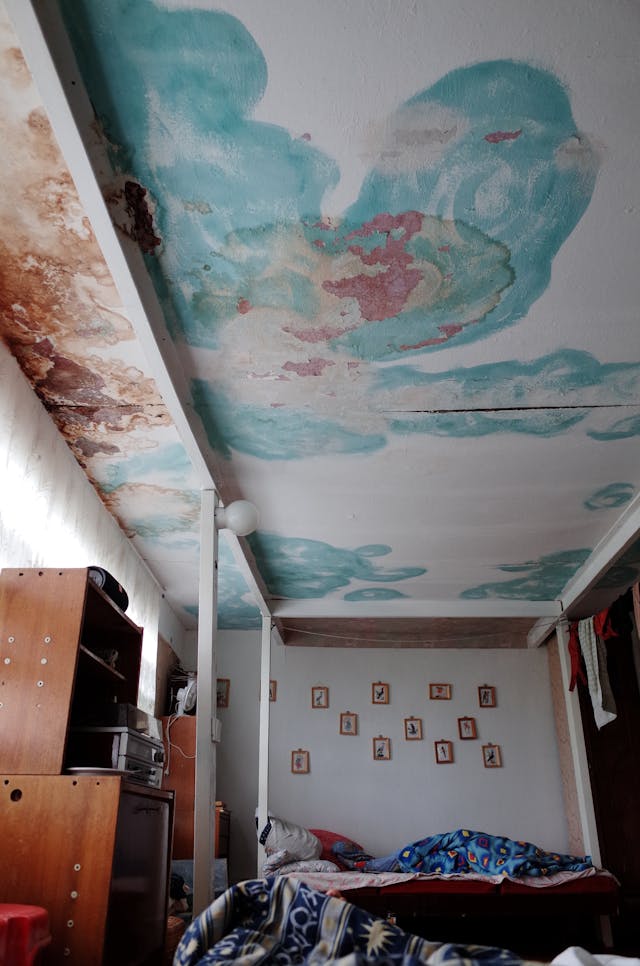 A water damaged ceiling caused by a burst water pipe