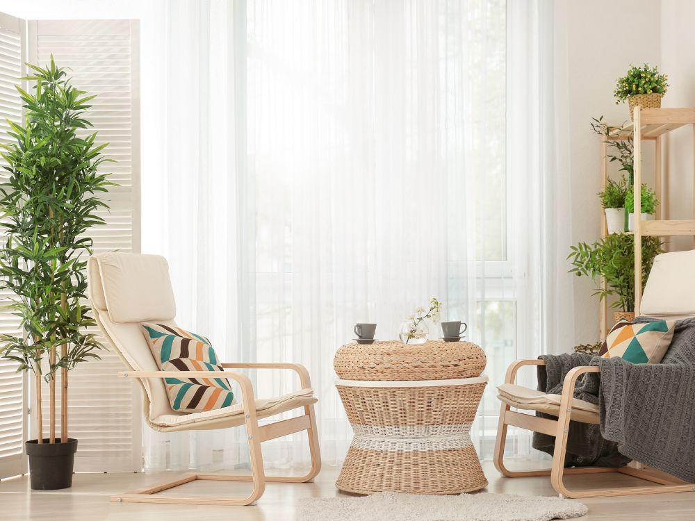 An image of a living room utilizing a biophilic design. 