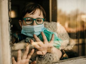 An image of a kid during covid.