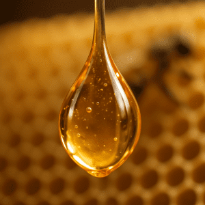 An image of a honey drop for an article about honey shelf life.