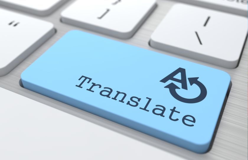 An image of a keyboard with a large translate button. 