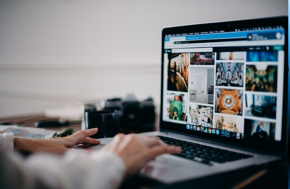 An image of a person using a laptop., 