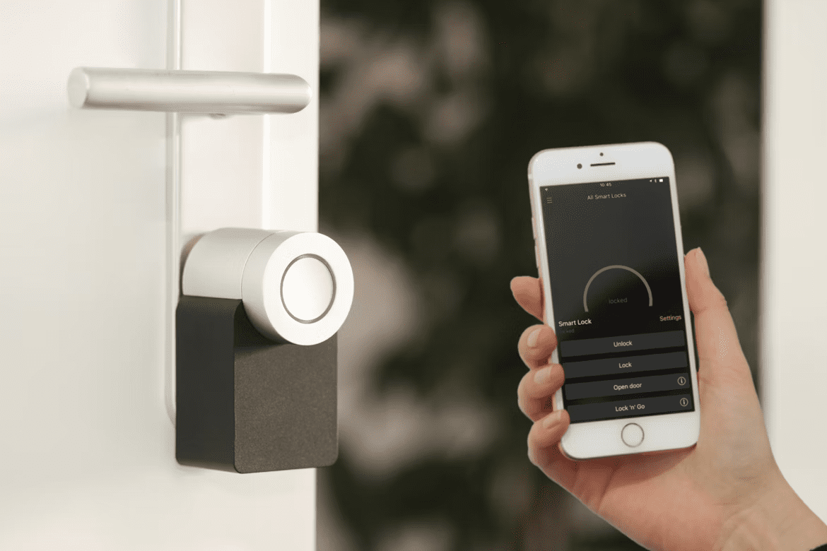An image of a person using a smart door lock.